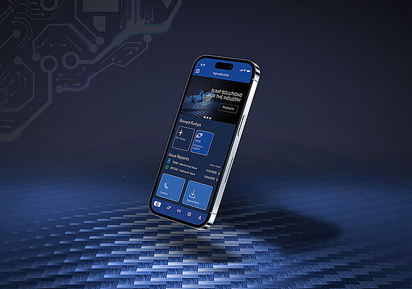 Smartphone mit Brinkmann App bproductive auf blauem Hintergrund