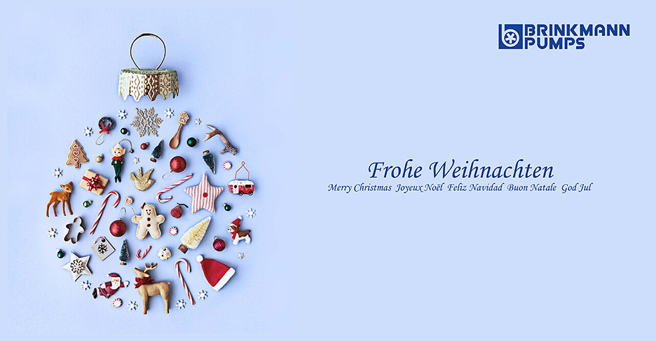 Symbolic Christmas bauble with Merry Christmas on blue